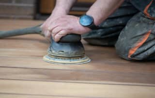 At In Home Flooring, a pro sands wood floors—how long does hardwood refinishing take? Most projects take 3–7 days for a complete hardwood refinish.