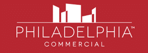 Philadelphia Commercial logo with city skyline design.