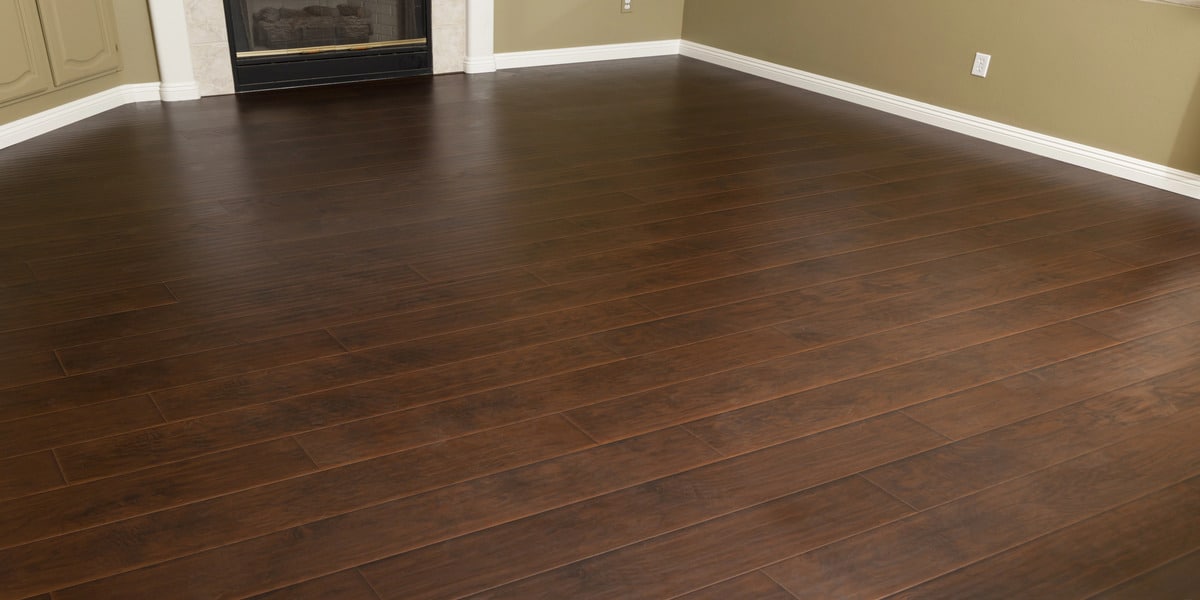 What’s the best low-maintenance flooring? In Home Flooring showcases durable brown laminate that’s easy to clean and perfect for busy homes.